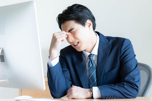 めまいがする男性